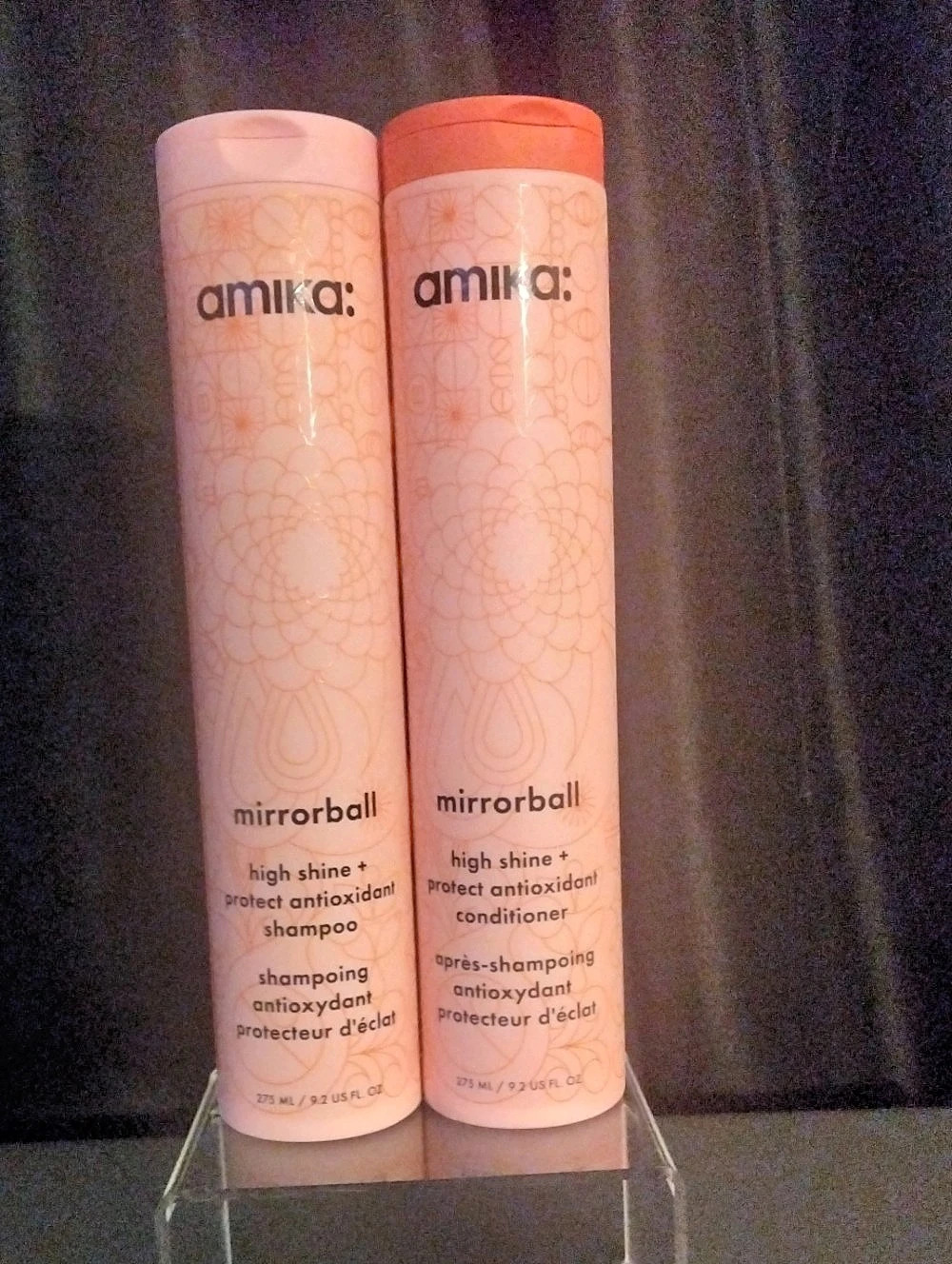 amika: mirrorball high shine + protect antioxidant shampoo and conditioner: Pink